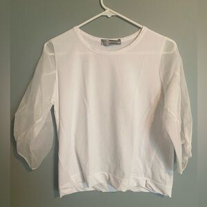 D. Exteriors blouse white with sheer sleeves